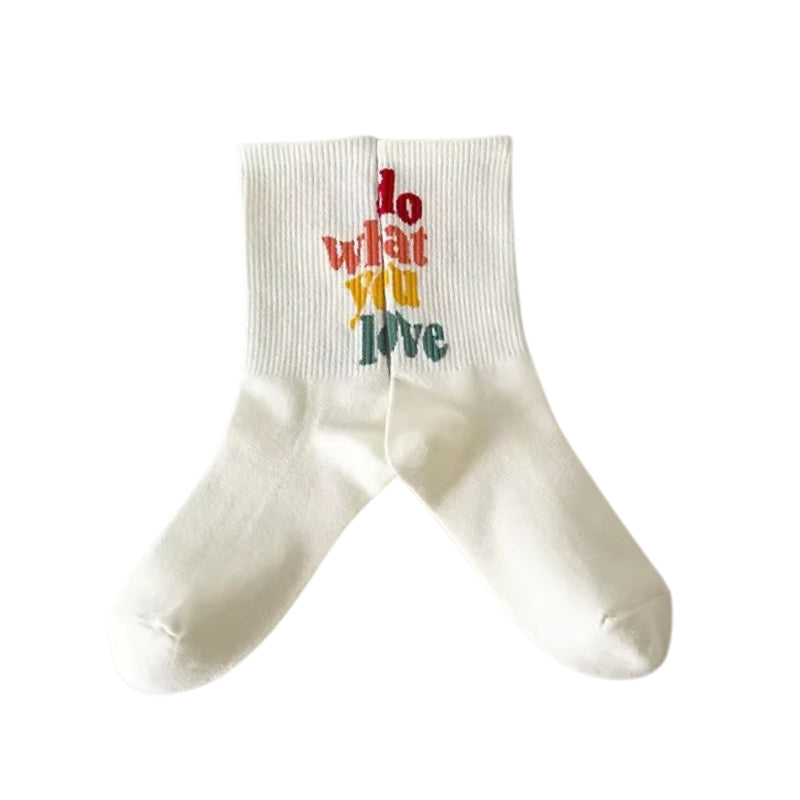 Chaussette Do What You Love sur fond blanc