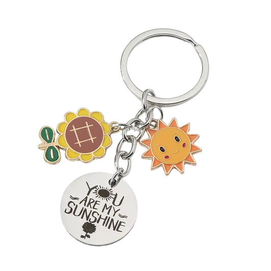 Porte Clé Soleil en Email You Are My Sunshine sur fond blanc