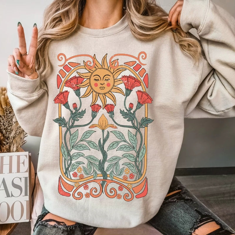 Sweat Vintage Soleil et Fleurs porté par une femme avec un jean gris